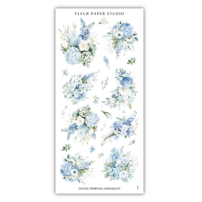 a collection of floral arrangements in various shades of blue and white, including hydrangeas, roses, and other flowers. The text "FLÉR PAPER STUDIO" is visible, indicating the source or publisher of the image.