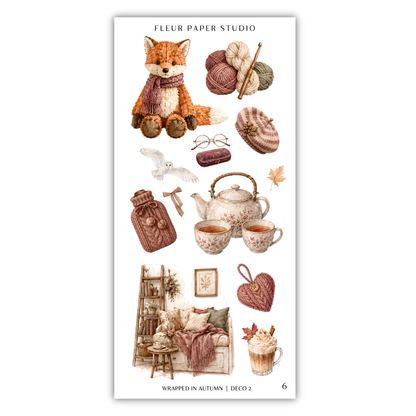 The image is a collage of various autumn-themed items, including a stuffed animal fox, yarn, knitting needles, a teapot, a mug, a heart, a book, a chair, a table, and a bird.