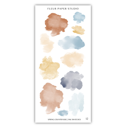 The image is a collection of 12 abstract watercolor brush strokes in various colors, including shades of brown, blue, and yellow, arranged in a vertical format.