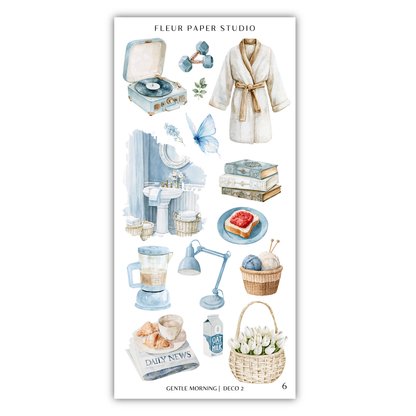 various objects and scenes related to daily life, such as a record player, a robe, a book, a lamp, a basket of flowers, a bowl of fruit, and a newspaper.