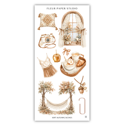 various autumn-themed items, including a pillow, a window, a camera, a basket of food, a tree, a hammock, and a bird feeder.